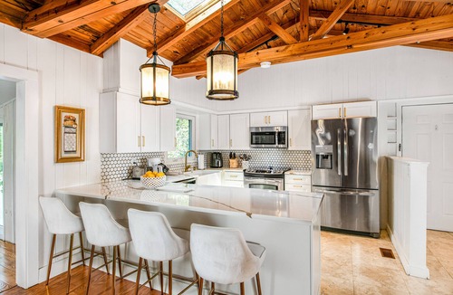 Flat Rock House | Modern lake-front home, dog-friendly, dock, hot tub, deck, pool, tennis, wifi