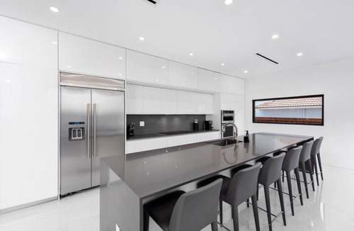 Glenvar Heights Villa | Modern Lakefront Villa w/Pool, Jacuzzi and Gym