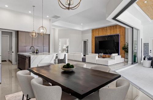 Cape Coral Villa | Modern Luxury Oasis Pool and Dock
