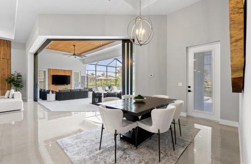 Cape Coral Villa | Modern Luxury Oasis Pool and Dock
