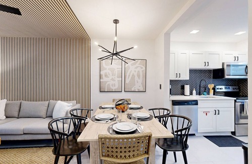 Poinsettia Heights House | Modern smart-home villa w/private backyard & fully equipped kitchen