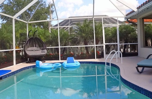Naples Park House | Modern villa, short walk to the beach, screened heated pool