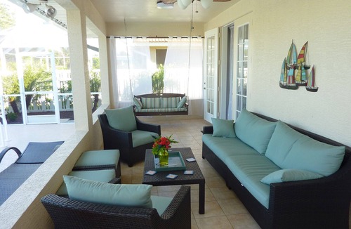 Naples Park House | Modern villa, short walk to the beach, screened heated pool