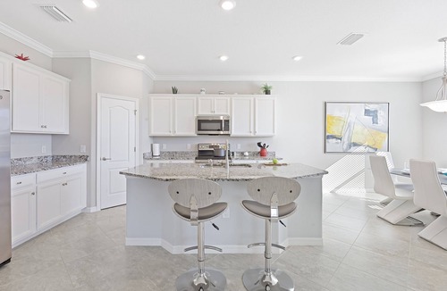 Naples House | Modern waterfront home in Artesia w/pool/gym