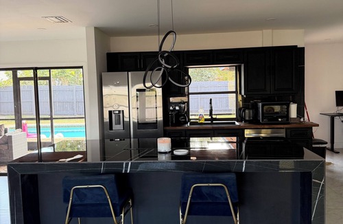 West Palm Beach House | Modern West Palm Beach Retreat w/Pool, Workspace & Private Yard