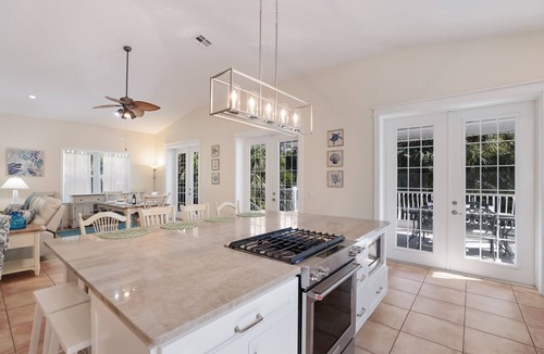 Anna Maria House | Mon Ami: Pine Ave Location! Pool! 3 Blocks to Gulf or Bay by Anna Maria Life Vacation Rentals