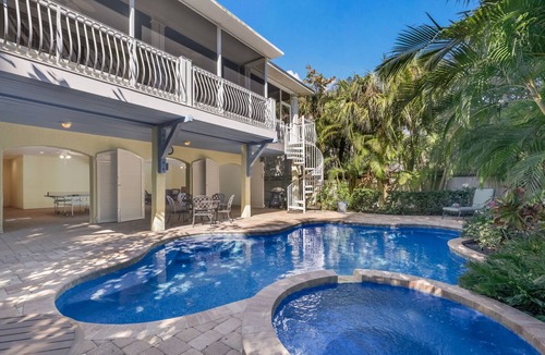 Anna Maria House | Mon Ami: Pine Ave Location! Pool! 3 Blocks to Gulf or Bay by Anna Maria Life Vacation Rentals
