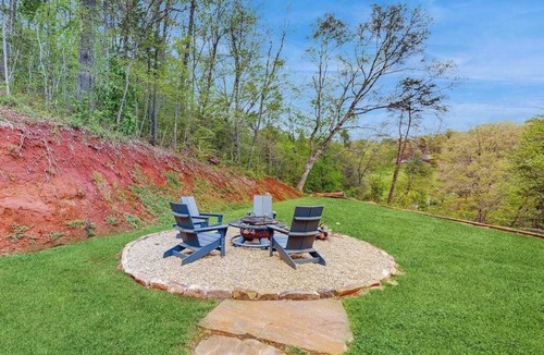Webster House | Mountain view home with a large patio and private hot tub | fire-pit | gas grill