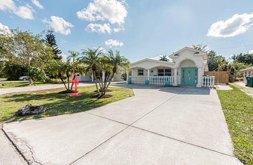 Naples Park House | Naples Park Home: w/private screened lanai, heated salt water pool/spa, poolside cabana w/TV