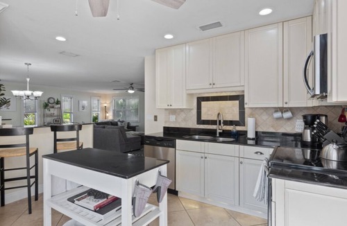 Naples Park House | Naples Park Pool & Spa Home 1 Mile to Beach and Tropical Oasis Fenced Yard.