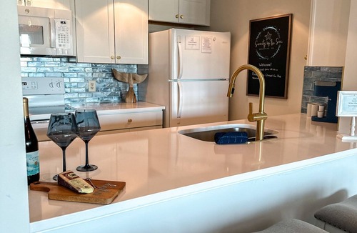 Southend Condo | NEW! Beachside, Two Pools & Partial Ocean View! Just Renovated Penthouse Condo