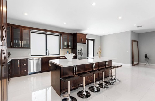 Ludlam House | New Central Miami Home, Sleeps 20, 70' TV, Pool, Game Room, Spacious Backyard