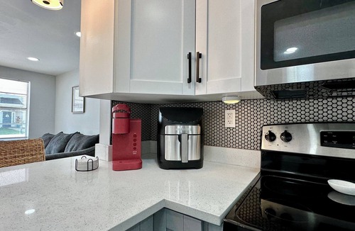 Hudson Beach Estates House | NEW! Facing Canal w/Grill, Outdoor Hangout Area & Cornhole