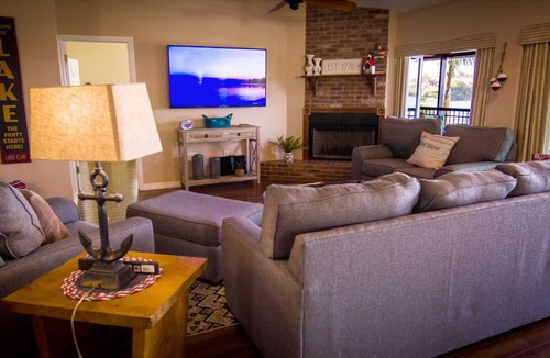 Sylvan Shores House | NEW! Lake Clay Waterfront Escape w/ Pool & Dock!