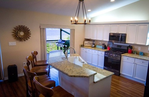 Sylvan Shores House | NEW! Lake Clay Waterfront Escape w/ Pool & Dock!