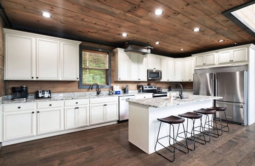 Sevierville Cabin | New! Luxe Pool Cabin w/MTN Views*Hot Tub*Fire pit