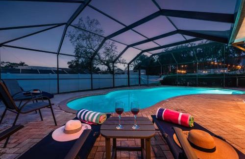 Palma Sola House | NEW Sunshine Getaway Heated Pool Hot Tub Games Villa