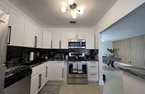 Ludlam House | New! The Moon House with Pool, Arcade & Basketball
