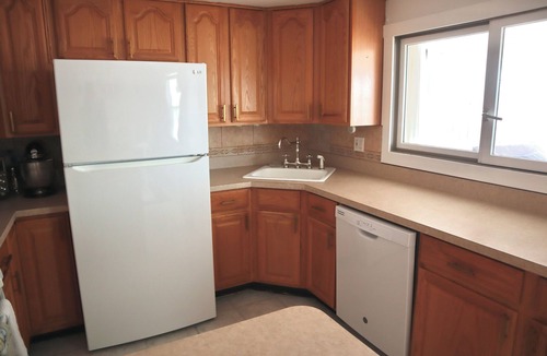 Mystic Island House | New! Spacious 4-Bedroom, Sleeps & Seats 12, Waterfront in Little Egg Harbor