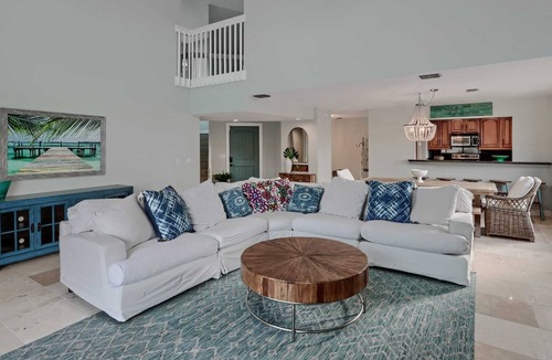 Juno Beach House | NEW! Walk to the Beach Juno Beauty w/ Pool & Bikes