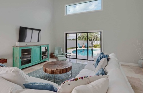 Juno Beach House | NEW! Walk to the Beach Juno Beauty w/ Pool & Bikes
