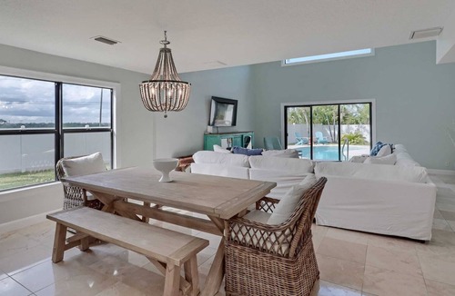 Juno Beach House | NEW! Walk to the Beach Juno Beauty w/ Pool & Bikes