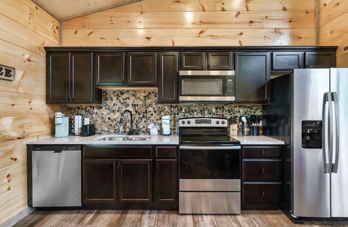 Sevierville Cabin | Newly Built Cabin! Hot Tub! Foosball! 5 MI to Pigeon Forge! Mountain Views!