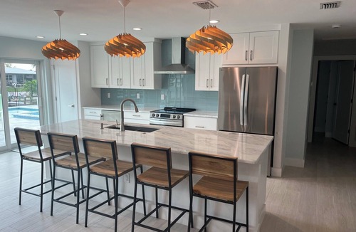 Englewood House | Newly Remodeled Waterfront Home with Heated Pool/Spa and Dock Close to Beach