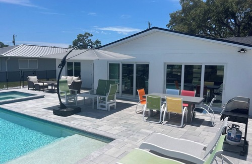 Englewood House | Newly Remodeled Waterfront Home with Heated Pool/Spa and Dock Close to Beach