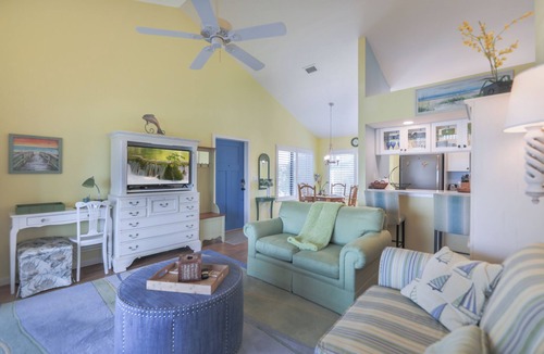 The Dunes House | Nicely updated Sanibel duplex home located in The Dunes with lake view.