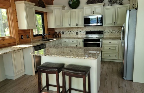 La Follette House | Norris Point-Accommodates 20, Waterfront, NO STEPS, Family Fun, Covered Dock.