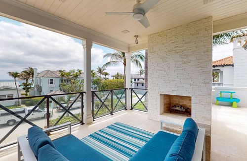 Ocean Ridge House | Ocean view estate w/in ground outdoor pool, breezy terraces, and covered lanai
