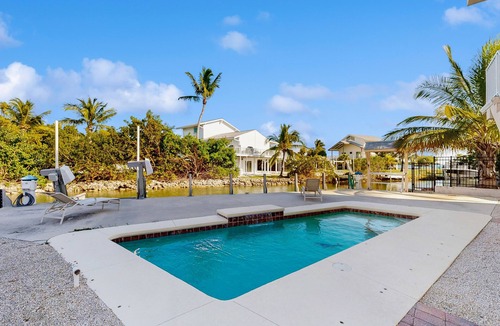 Cutthroat Harbor Estates House | Ocean-view snowbird retreat with private pool, rooftop, lanais, kayak & bikes