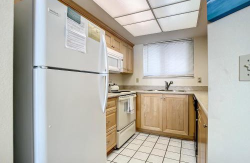 New Smyrna Beach Apartment | Ocean View with a beachfront pool at Ocean Trillium Condo ~ 402