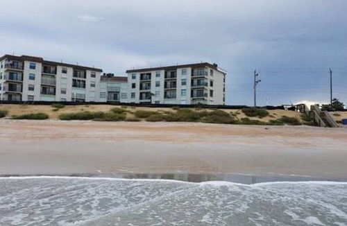 Glenwood Condo | OCEANFRONT 3BR/2BA sleeps 8. Updated amenities, with balcony. Beach & pool view.