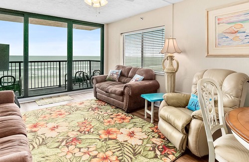 New Smyrna Beach Condo | Oceanfront condo with balcony, pool, tennis & shuffleboard
