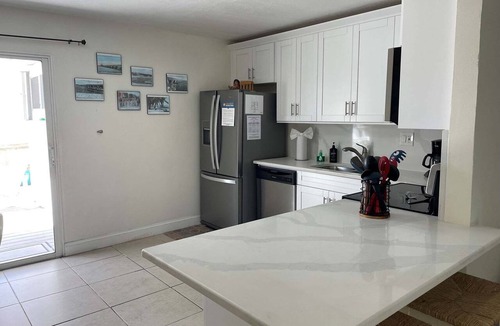 Layton House | Oceanfront Duplex with Beautiful Beach & Dock for Boat Access - Dogs OK
