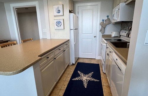 West Beach Village Villa | Oceanfront top floor condo, sunrises, dolphins, breezes, THREE private balconies