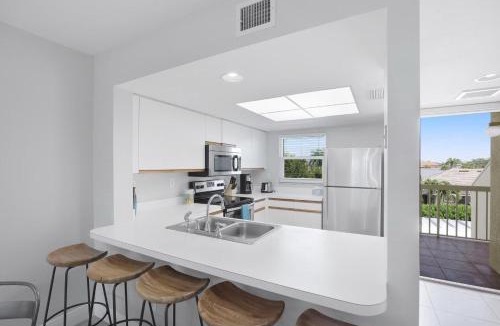 Marco Island House | Oceangoing condo with pool and steps to beach and food