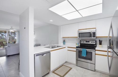 Marco Island House | Oceangoing condo with pool and steps to beach and food