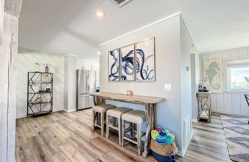 Sea Dunes Condo | Octopus Garden, A Luxurious Townhome Overlooking Pool! Ocean Views!