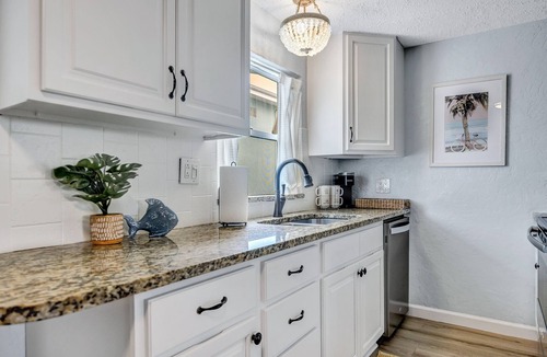 Port Canaveral Condo | Only 1 block from the beach, with private patio and a Pool!