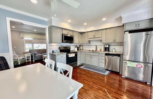 Southend Condo | Our condo, sands, and gentle waves beckon you to indulge in coastal bliss.