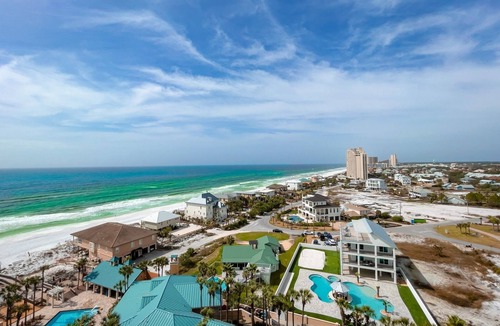 Gulf Pines Condo | Paradise Found: Experience Beachfront Accommodations ~ Resorts Largest Pool Deck