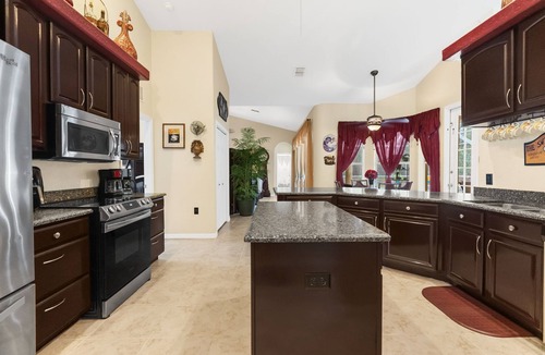 Brooksville House | Paradise found! Private heated pool spa . 3700 sq ft of luxury on 2+ acres!