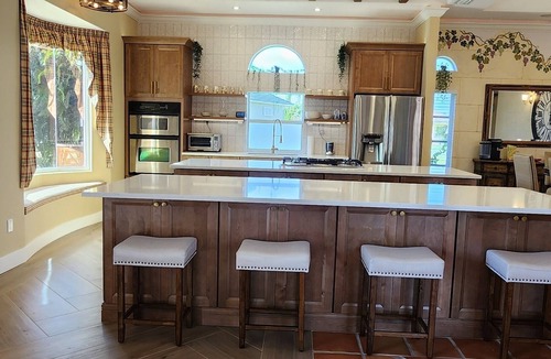 Punta Gorda House | Paradise Palace King bed
