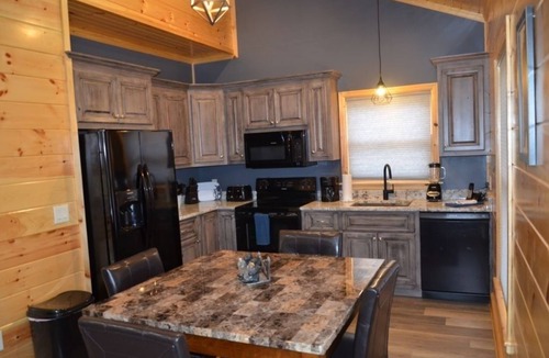 Tellico Plains Cabin | Peaceful family cabin near fishing with over 100 acres of mountain and field trails to explore!
