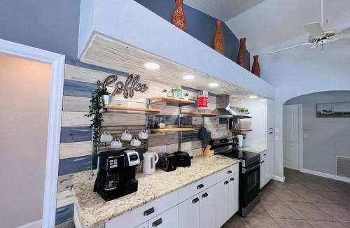 Port Charlotte House | Peachland getaway with pool and tiki bar