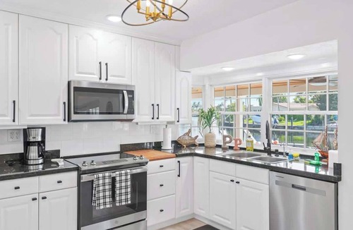 Cypress Lakes Villa | Pelican Point - Waterfront Villa with View, Pool & Boat Rental