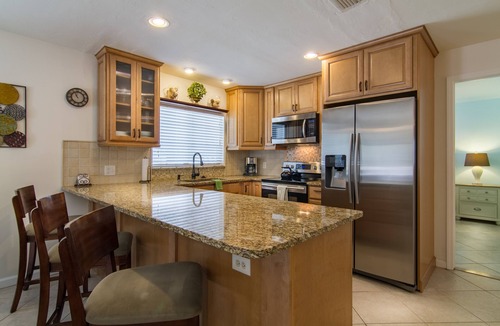 Naples Park House | Perfect recipe for relaxing, heated pool, walk to beach, bikes, stunning sunsets